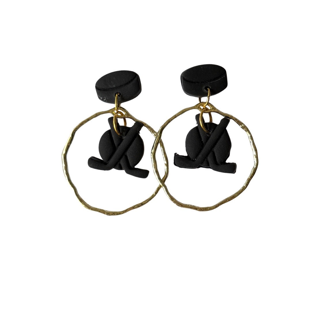 Hockey Pucks and Sticks