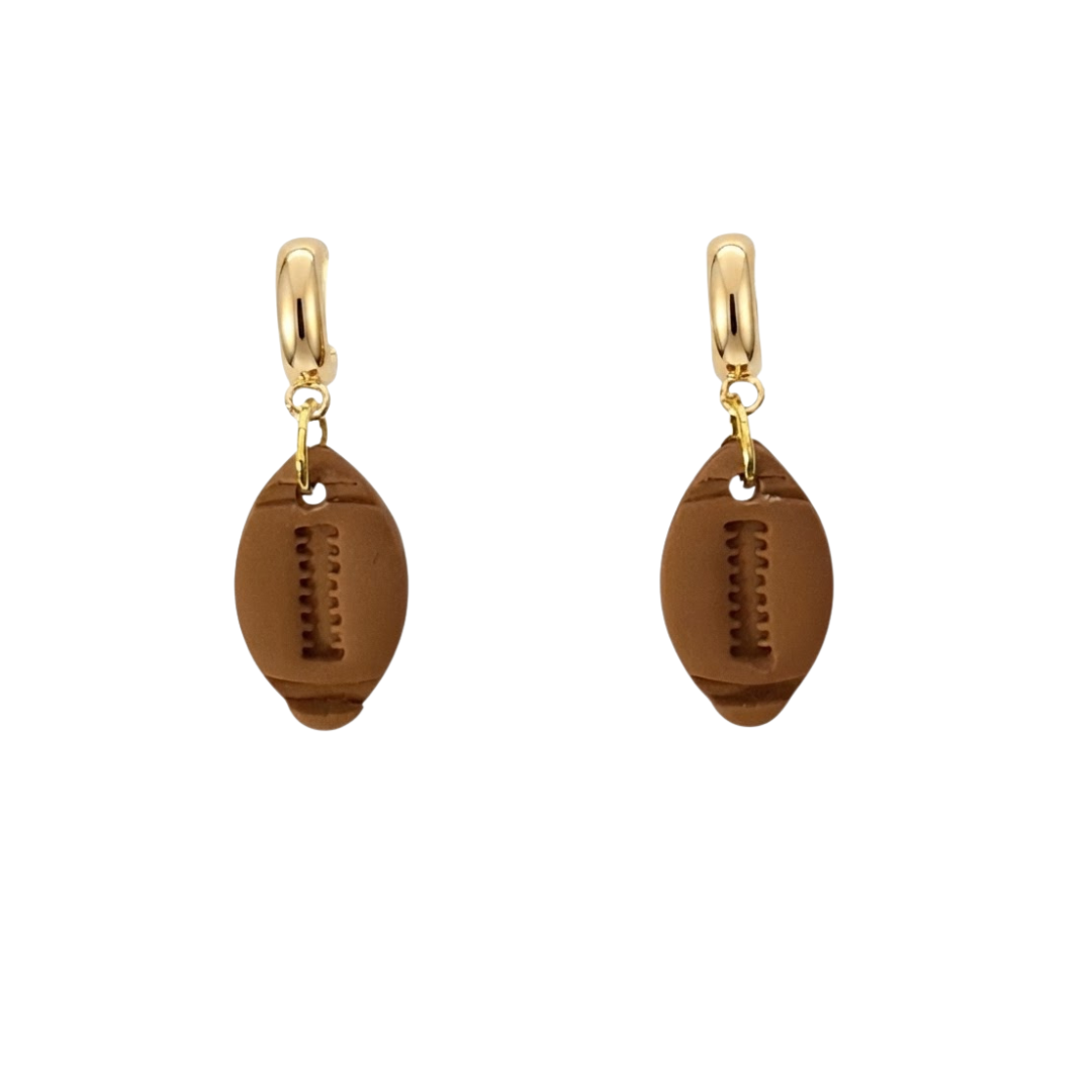Brown mini polymer clay football earrings on gold huggie cuffs